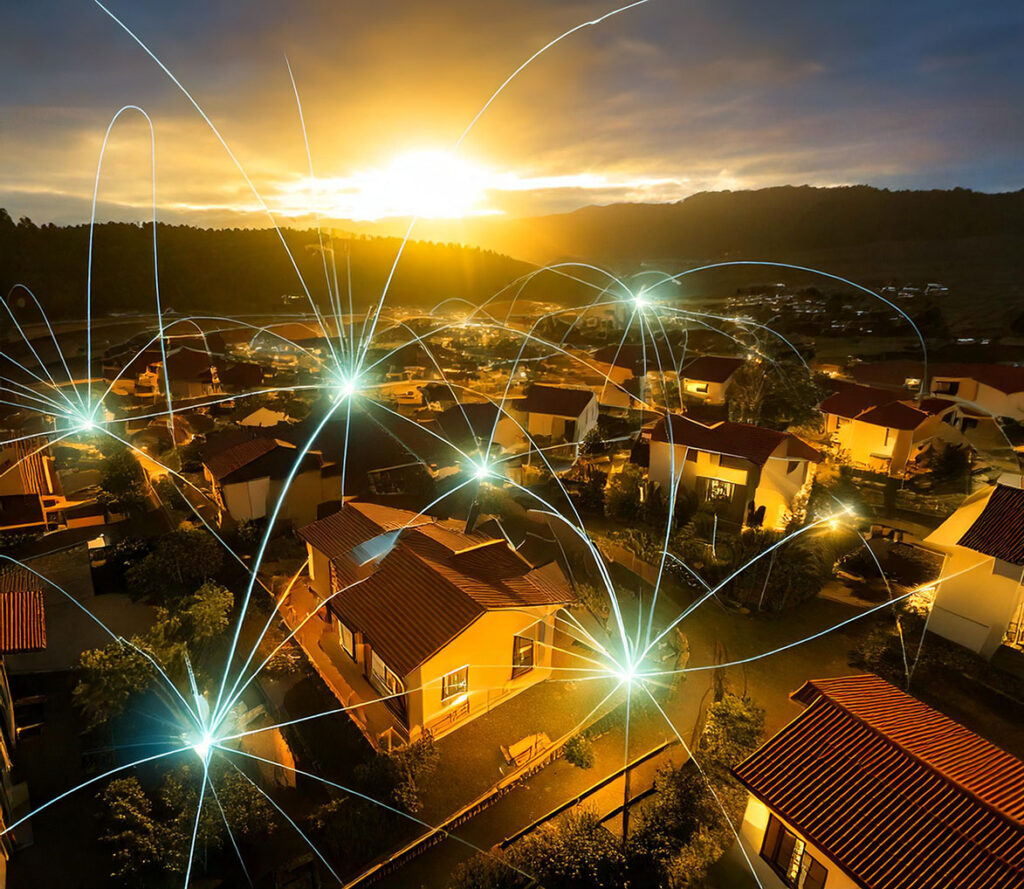 comunità di case vista dall'alto con scintille di energia che collegano le abitazioni